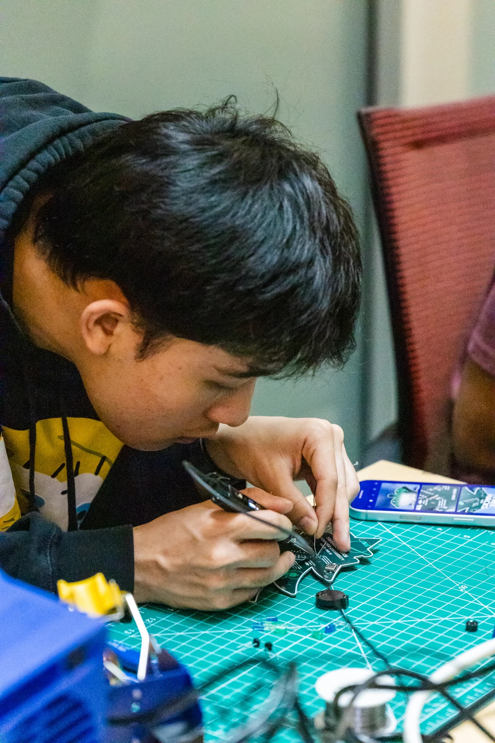 Soldering components onto a badge